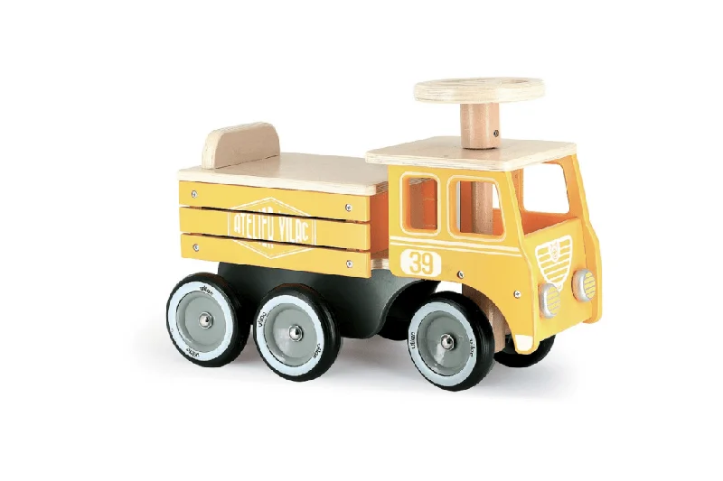 sturdy and durable wooden toys for rough play                   Construction Truck Ride On