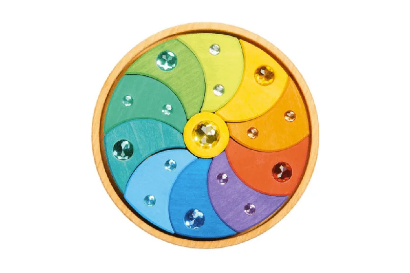 historically inspired wooden toys that teach history                   Gluckskafer Spinning Sparkling Swirl